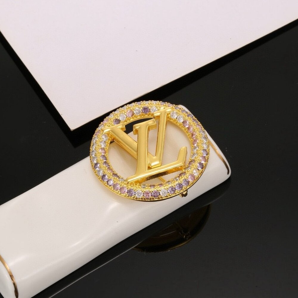 Louis Vuitton Gold and Purple Brooch Louis Vuitton Gold and Purple Brooch